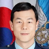 Colonel Simon Kim
